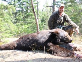 Guest Posing After Successful Bear Hunt