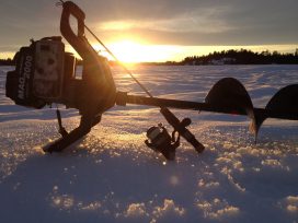 Ice Fishing Hole Auger And Fishing Pole